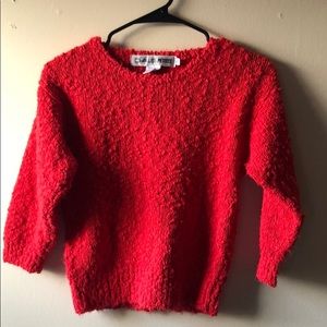 Red quarter length sleeve sweater